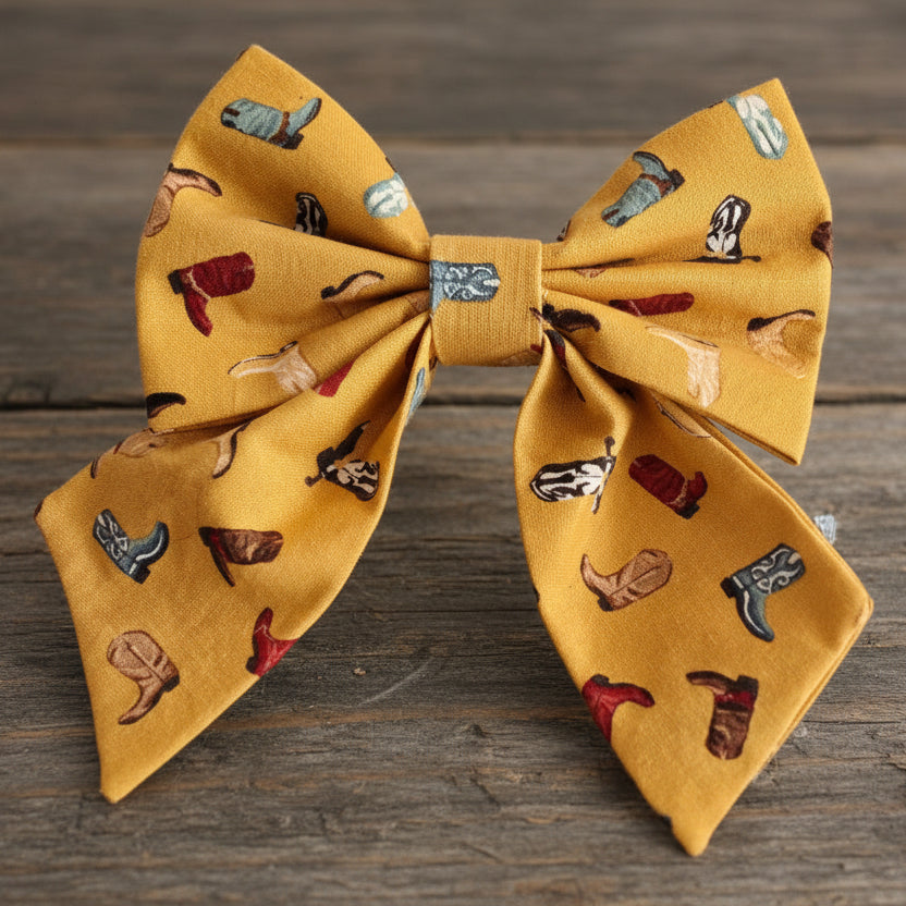 Sailor bow with cowboy boot pattern on a mustard yellow background